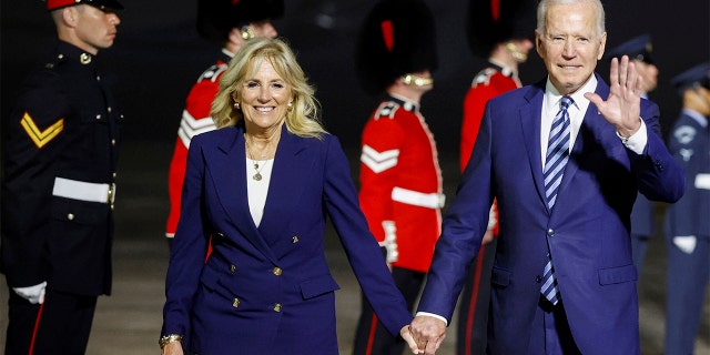 U.S. President Joe Biden and first lady Jill Biden arrive on Air Force One at Cornwall Airport Newquay, near Newquay, England, ahead of the G7 summit in Cornwall, early Thursday, June 10, 2021. (Phil Noble/Pool Photo via AP)