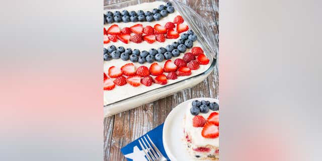 This easy-to-make 4th of July Icebox Cake recipe from food blog Little Sweet Baker, includes layers of fruit, graham crackers and a special cream filling. 