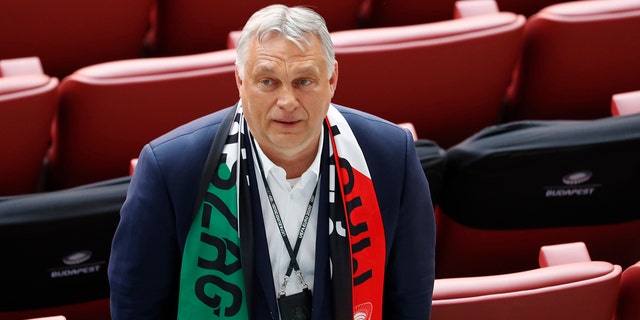 FILE - In this Tuesday, June 15, 2021 file photo Hungary's Prime Minister Viktor Orban attends the Euro 2020 soccer championship group F match between Hungary and Portugal at the Ferenc Puskas stadium in Budapest, Hungary.  (AP Photo/Laszlo Balogh, Pool, File)