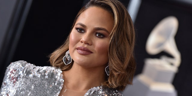 Chrissy Teigen is ‘stepping away’ from cleaning brand Safely amid her bullying scandal. (Photo by Axelle/Bauer-Griffin/FilmMagic)
