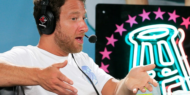 Dave Portnoy, founder of Barstool Sports, speaks during a radio broadcast prior to Super Bowl LIV on January 30, 2020 in Miami Beach, Florida. 