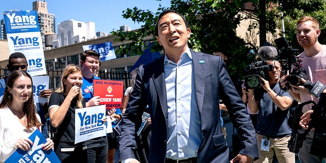 New York City mayoral candidate Andrew Yang arrives to an early voting site before casting his vote, Wednesday, June 16, 2021, in New York. (AP Photo/John Minchillo)