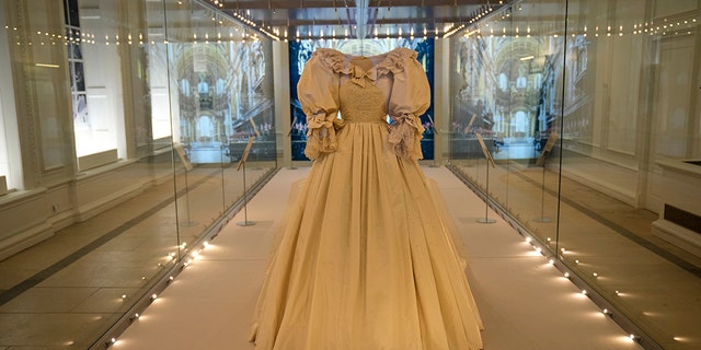 The wedding dress of Britain's Princess Diana is displayed at the "Royal Style in the Making" exhibition at Kensington Palace. (AP Photo/Matt Dunham)