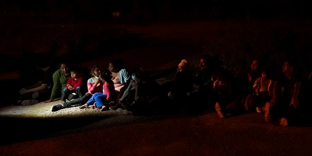Migrants mainly from Honduras and Nicaragua line up after surrendering crossing the US-Mexico border on Monday, May 17, 2021 in La Joya, Texas. (Associated press)