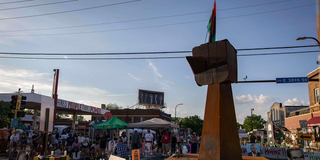 Community members gathered in George Floyd Square to demand justice for Winston Boogie Smith Jr. on Monday, June 7, 2021. Smith was fatally shot by members of a U.S. Marshals Task Force. (AP Photo / Christian Monterrosa)