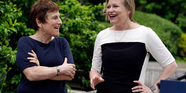 Liz Abzug, left, daughter of the late U.S. Rep. Bella Abzug, talks with Democratic candidate for mayor of New York Kathryn Garcia during a campaign event at Bella Abzug Park in New York, Tuesday, June 8, 2021. Abzug approved Garcia's candidacy. (AP Photo / Richard Drew)