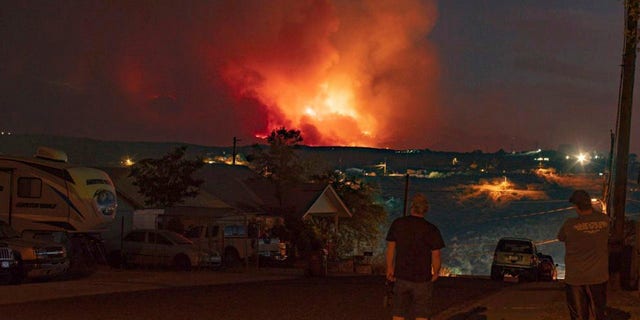 In this photo provided by Joseph Pacheco, a wildfire is seen burning in Globe, Ariz., on Monday, June 7, 2021. (Joseph Pacheco via AP)