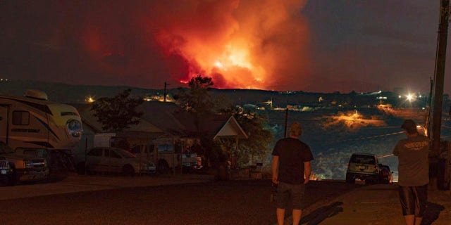 In this photo provided by Joseph Pacheco, a wildfire is seen burning in Globe, Ariz., on Monday, June 7, 2021. (Joseph Pacheco via AP)