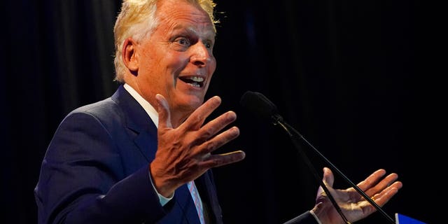 Winner of the Virginia Democratic gubernatorial primary, former Virginia Gov. Terry McAuliffe, gestures as he addresses the crowd during an election party in McLean, Va., Tuesday, June 8, 2021. McAuliffe faced four other Democrats in Tuesday's primary. (AP Photo/Steve Helber)