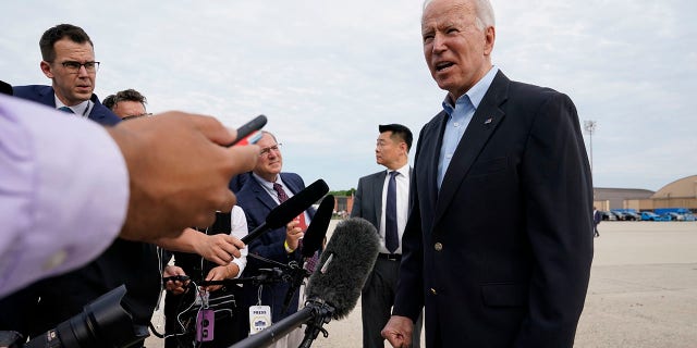 President Joe Biden speaks with reporters before boarding Air Force One, Wednesday, June 9, 2021, at Andrews Air Force Base, Md. (AP Photo/Patrick Semansky)