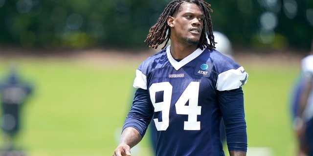 Randy Gregory (94) walks the field during an NFL football team practice, in Frisco, Texas on June 8, 2021.