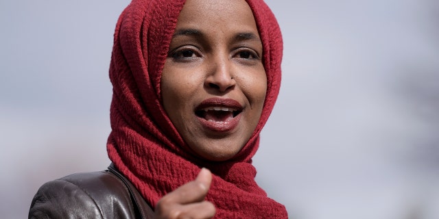 Rep. Ilhan Omar, D-Minn., pretended to be handcuffed on Tuesday when she was arrested at a protest. (AP Photo/Morry Gash, File)