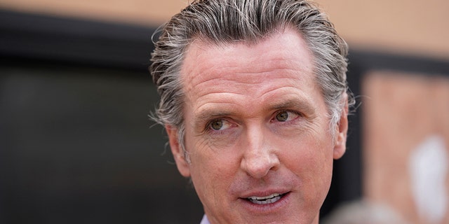 California Gov. Gavin Newsom listens to questions during a news conference in San Francisco. 