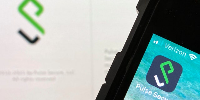 An Icon for the Pulse Secure smartphone app, right, and a computer desktop info page, left, are seen in Burke, Va., on Monday, June 14, 2021. (AP Photo)