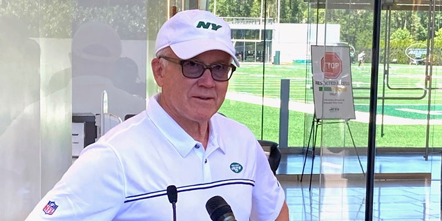 New York Jets owner and chairman Woody Johnson speaks to reporters at the team’s NFL football facility in Florham Park, N.J, Wednesday, June 16, 2021. (AP Photo/Dennis Waszak Jr.)
