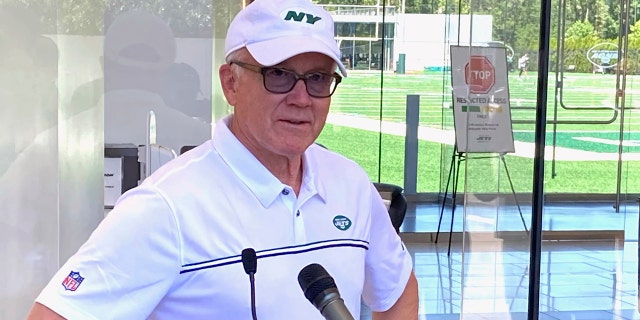 New York Jets owner and chairman Woody Johnson speaks to reporters at the team’s NFL football facility in Florham Park, N.J, Wednesday, June 16, 2021. (AP Photo/Dennis Waszak Jr.)