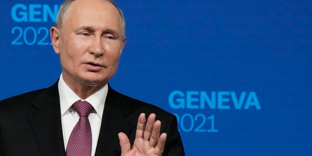 Russian President Vladimir Putin speaks at a press conference after his meeting with US President Joe Biden at the 