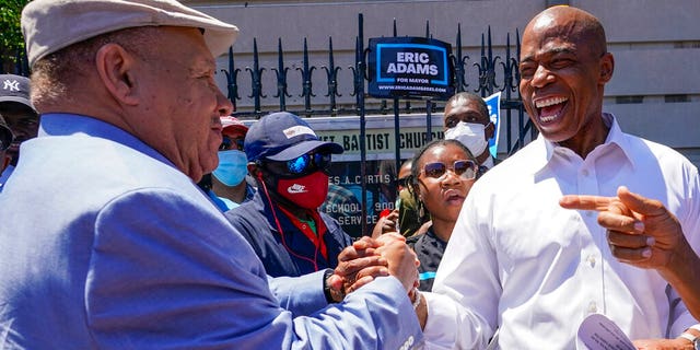 Democratic mayoral candidate Eric Adams greets supporters during a campaign event, Thursday, June 17, 2021, in the Harlem neighborhood of New York. 