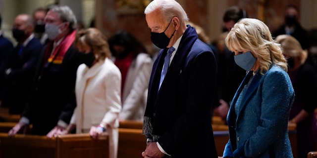 Then-President-elect Joe Biden and his wife Jill Biden attend mass at St. Matthew the Apostle's Cathedral during Inauguration Day ceremonies in Washington, January 20, 2021. ( Associated Press)