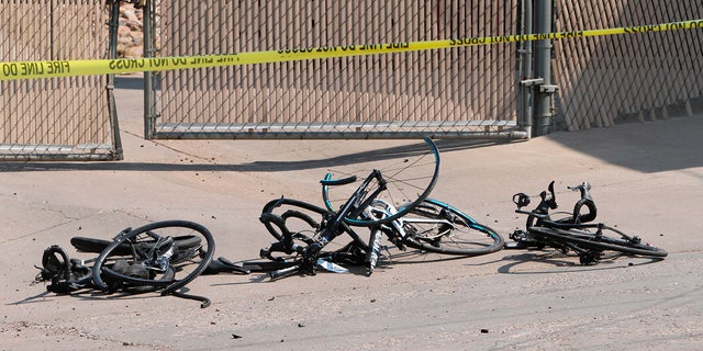 This Saturday, June 19, 2021, photo courtesy of The White Mountain Independent shows the scene of an accident with broken bicycles in Show Low, Ariz.