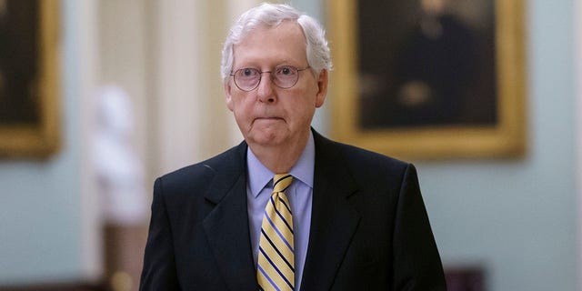 Senate Minority Leader Mitch McConnell, R-Ky., walks to the chamber at the Capitol in Washington, Tuesday, June 22, 2021.