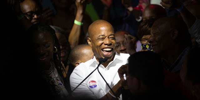 Mayoral candidate Eric Adams mingles with supporters during his election night party, late Tuesday, June 22, 2021, in New York. (AP Photo/Kevin Hagen)
