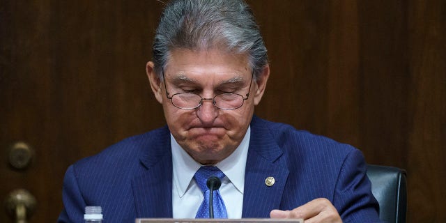 Sen. Joe Manchin, D-W.Va., chairs a Senate Energy and Natural Resources Committee hearing on infrastructure needs of the U.S. energy sector, western water and public lands, at the Capitol in Washington, Wednesday, June 23, 2021. Manchin hasn't publicly announced how he will vote on the nomination of David Chipman to run the ATF. (AP Photo/J. Scott Applewhite)