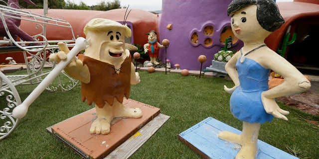 Aside from sculptures of Fred Flintstone and Barney Rubble, Fang’s front yard includes a variety of decorations, not all of which are Flintstones related.