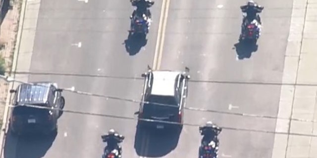 A procession for a fallen Arvada, Colo., police officer.