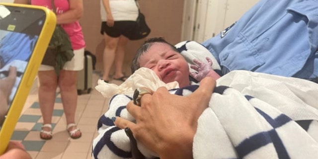 The newborn girl's mother decided to name her Mia, after the airport where she was born.