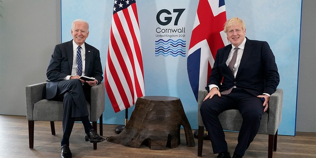 President Biden and British Prime Minister Boris Johnson visit during a bilateral meeting ahead of the G-7 summit, Thursday, June 10, 2021, in Carbis Bay, England. (AP Photo/Patrick Semansky)