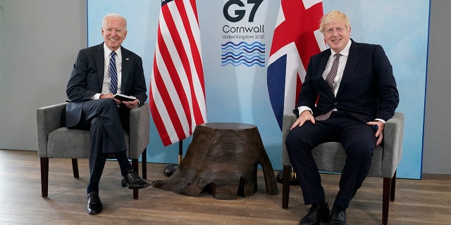 President Biden and British Prime Minister Boris Johnson visit during a bilateral meeting ahead of the G-7 summit, Thursday, June 10, 2021, in Carbis Bay, England. (AP Photo/Patrick Semansky)