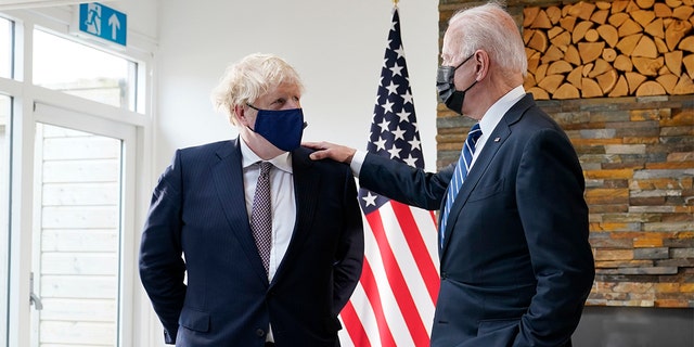 President Joe Biden and British Prime Minister Boris Johnson talk ahead of the G-7 summit on June 10, 2021, in Carbis Bay, England.
