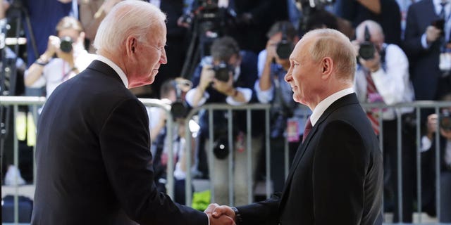 GENEVA, SWITZERLAND – JUNE 16, 2021: U.S. President Joe Biden (L) and Russia's President Vladimir Putin shake hands as they meet for talks at the Villa La Grange. Mikhail Metzel/TASS.