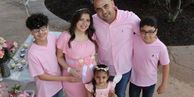 Rima Aldebbeh told Fox News that when she found out she was pregnant with twins, she was overwhelmed because she already has three other children. Aldebbeh and her family are pictured at a baby shower at the hospital, before the twins were born.