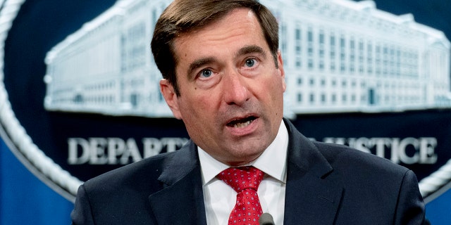 FILE - In this Oct. 19, 2020 file photo, Assistant Attorney General for the National Security Division John Demers speaks at a news conference at the Department of Justice in Washington. (AP Photo/Andrew Harnik, pool)