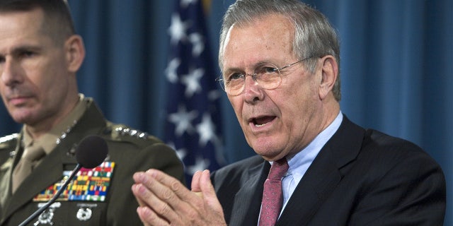 Then-Secretary of Defense Donald Rumsfeld during a briefing with Chairman of the Joint Chiefs of Staff, Marine General Peter Pace, at the Pentagon March 7, 2006 in Arlington, Virginia.  