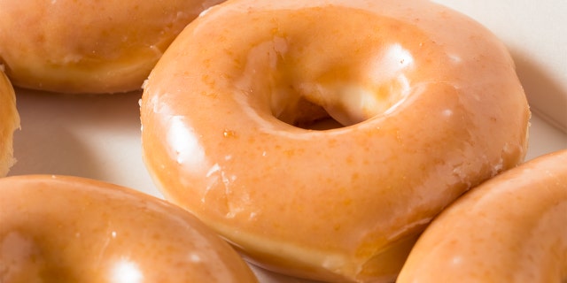 At Clinton Hall in NYC, you can find a unique grilled cheese sandwiched between a glazed donut.