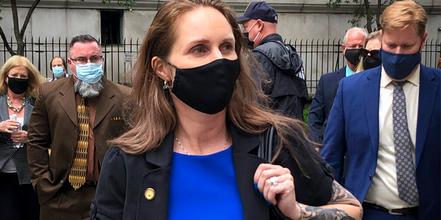 Natalie Mayflower Sours Edwards, center, leaves court after receiving a six-month prison sentence for leaking confidential financial reports to a journalist at Buzzfeed, Thursday June 3, 2021, in New York.