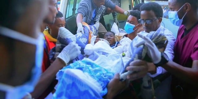In this image made from video, an injured victim of an alleged airstrike on a village arrives in an ambulance at the Ayder Referral Hospital in Mekele, in the Tigray region of northern Ethiopia, Wednesday, June 23, 2021. (AP Photo)