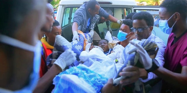 In this image made from video, an injured victim of an alleged airstrike on a village arrives in an ambulance at the Ayder Referral Hospital in Mekele, in the Tigray region of northern Ethiopia, Wednesday, June 23, 2021. (AP Photo)