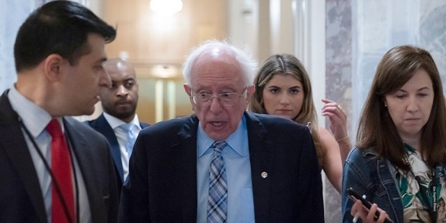 Sen. Bernie Sanders, I-Vt., speaks with reporters as the Senate prepares for a key test vote on the For the People Act, a sweeping bill that would overhaul the election system and voting rights, at the Capitol in Washington, Tuesday, June 22, 2021. The bill is a top priority for Democrats seeking to ensure access to the polls and mail in ballots, but it is opposed by Republicans as a federal overreach. (AP Photo/Alex Brandon)