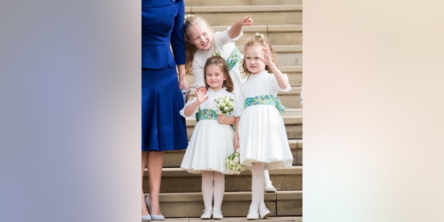Van links: Bridesmaids Princess Charlotte of Cambridge, Savannah Phillips and Maud Windsor after the wedding of Princess Eugenie of York and Jack Brooksbank at St. George's Chapel on October 12, 2018, in Windsor, Engeland.