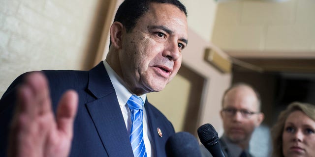 Rep. Henry Cuellar talks with reporters in the Capitol after a meeting of House Democrats on June 27, 2019.