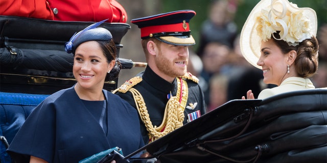 Kate Middleton (right) allegedly wanted to smooth things over with the Duke and Duchess of Sussex.