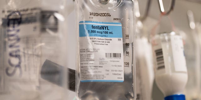 A bag of fentanyl hangs from an intravenous (IV) drip machine in a patient's room at the Covid-19 Intensive Care Unit (ICU) of Sharp Memorial Hospital in San Diego, California, U.S.