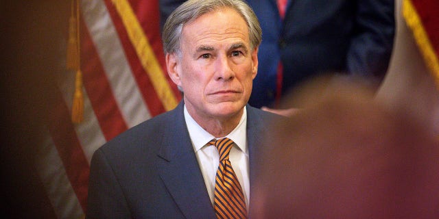 Texas Governor Greg Abbott attends a press conference where he signed Senate Bills 2 and 3 at the Capitol on June 8, 2021, in Austin, Texas.