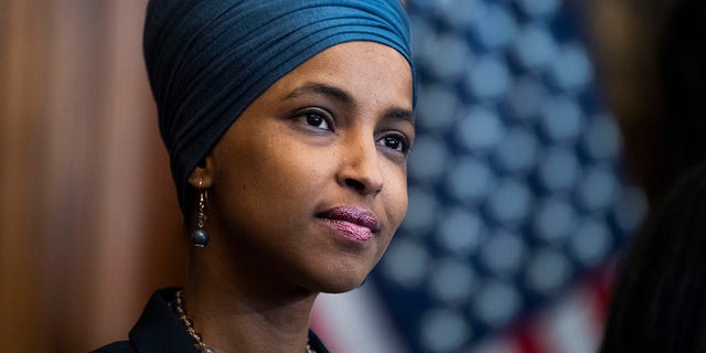 Rep. Ilhan Omar attends a bill enrollment ceremony for the Juneteenth National Independence Day Act in the Capitol on June 17, 2021. (Tom Williams/CQ-Roll Call Inc via Getty Images)