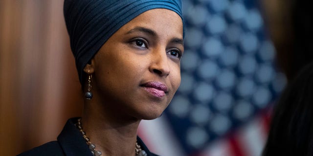 Rep. Ilhan Omar, D-Minn., attends a bill enrollment ceremony for the Juneteenth National Independence Day Act in the Capitol on Thursday, June 17, 2021. (Photo By Tom Williams/CQ-Roll Call, Inc via Getty Images)