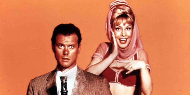 Barbara Eden Larry Hagman in character while filming their 60s sitcom